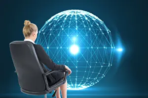 Well Dressed Prints: Composite image of businesswoman sitting on swivel chair in black suit