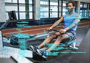 Data Processing Prints: Composite image of data processing against african american fit man working out at the gym