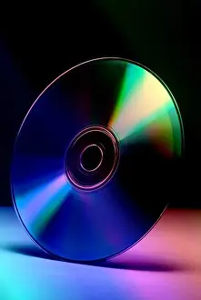 Silicon Prints: Computer Comm cd compact disc colors blue green purple pink reflection silicon plastic data storage concept technology