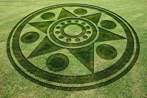 Occult Prints: Concentric circles and star fake crop circle in the meadow