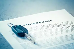 Rental Prints: Concept of car insurance - car policy with car keys on blue tone