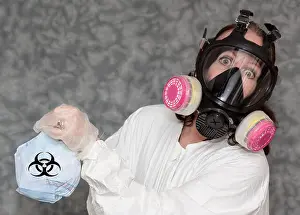 Infectious Prints: Concerned Woman with Gas Mask, gloves and Lab Coat holding Trash with Bio Hazard Symbol