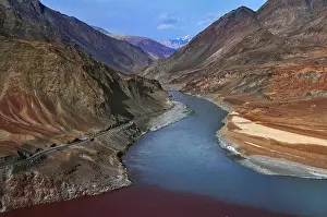 Infinity Prints: The confluence of the two mountain rivers: the Zanskar River blue color and the Indus River red color