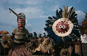 Ethnic Prints: CONGO Central Africa Bapende tribe masked dancers at Gungu festival