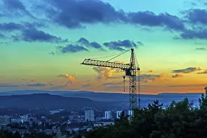 Building Site Prints: Construction crane silhouette at sunset
