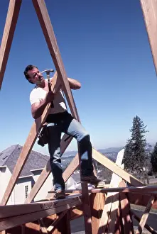 Condominiums Prints: Construction and homebuilding worker framing a new house