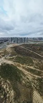 Aerial Shot Prints: Construction of a modern city block Multi-storey buildings made of glass and concrete