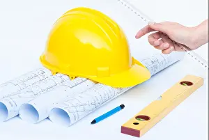 Hardhat Prints: Construction rolls and plans and yellow helmet