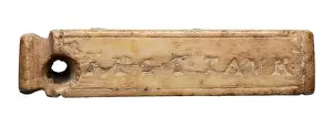 Latin Prints: A consular tessera, a small, parallelepiped-shaped ivory token