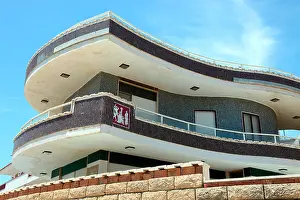 Curves Prints: Contemporary apartment building on the seafront in Marina di Ragusa, Sicily