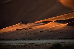Namib Prints: Contrasted abstract of the Oxide rich red sand dunes in the great sand sea of Namibia