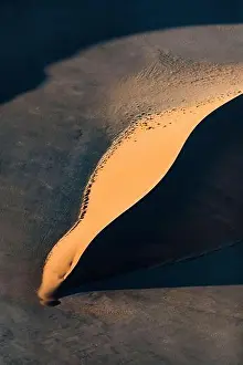 Contrasted abstract of the Oxide rich red sand dunes in the great sand sea of Namibia