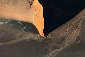 Contrasted abstract of the Oxide rich red sand dunes in the great sand sea of Namibia