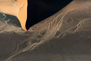 Contrasted abstract of the Oxide rich red sand dunes in the great sand sea of Namibia