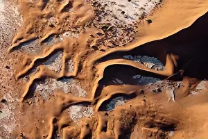 Contrasted abstract of the Oxide rich red sand dunes in the great sand sea of Namibia