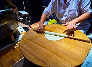 Stuffed Prints: A cook making Turkish Gozleme, a traditional Anatolian stuffed flatbread