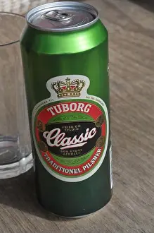 Danmark Prints: Copenhagen /Denmark/24 April 2023/ Tuborg classic pilsner can and glass cold drink in danish capital Copenhagen Denmark