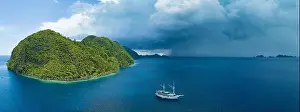 Coral reefs surround the dramatic limestone islands that have been uplifted from Raja Ampat's beautiful and biodiverse seascape