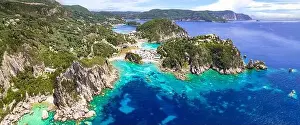 Paleokastritsa Prints: Corfu island. aerial drone view of popular and beautiful Paleokastrtsa tourist village and resort