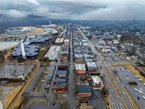Expressway Prints: Corning, NY, USA - 03-02-2024 - Cloudy winter aerial image of the downtown area in the City of Corning