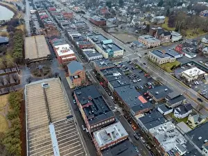 Expressway Prints: Corning, NY, USA - 03-02-2024 - Cloudy winter aerial image of the downtown area in the City of Corning