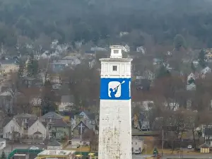 Expressway Prints: Corning, NY, USA - 03-02-2024 - Cloudy winter aerial image of the downtown area in the City of Corning