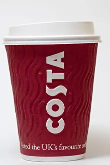 Mugs Prints: A Costa coffee disposable paper cup with a plastic lid and the name Costa printed prominently on the side