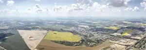 countryside landscape under blue sky with fluffy clouds on horizon on bright summer day. panoramic aerial view