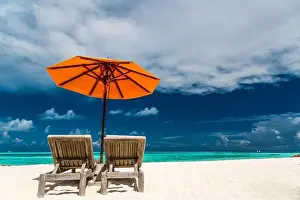 Couple beach vacation, tropical exotic landscape with blue sky and white sand. Luxury summer travel holiday destination. Beach scene, paradise island
