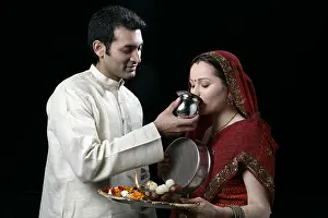 Asians Prints: Couple celebrating karva chauth