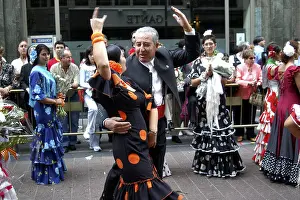 Zaragoza Prints: Couple dancing a Sevillana the typical dance from Andalucia during El Pilar celebration the traditional fiestas