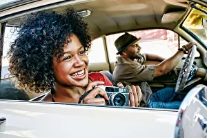 Mature Adult Prints: Couple driving in vintage car
