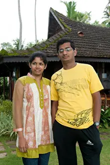 Spectacles Prints: Couple in heritage lake resort ; Kuttanad ; Alleppey Alappuzha ; Kerala ; India MR#777K;777L