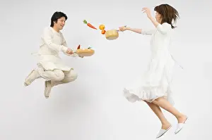 25 29 Years Prints: Couple holding flying pan