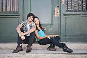 Unwinding Prints: Couple leaning on each other on front stoop