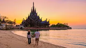 Chonburi Prints: A couple of men and women visit the Sanctuary of Truth