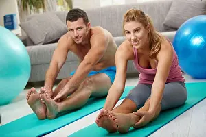 Mats Prints: Couple streching legs before exercises