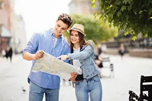 Honeymoon Prints: Couple of tourists is exploring new city together