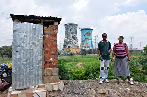 Cooling Prints: Couple in township showing outdoor toilet and Orlando Cooling Towers
