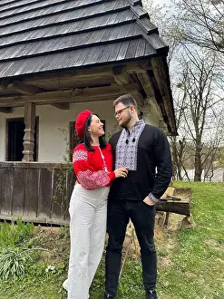 Embroidery Prints: Couple in Traditional Embroidered Clothing Outdoors