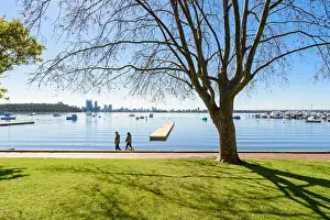 Western Australia Prints: Couple walking their dog along the foreshore of the Matilda Bay Reserve on the Swan River at Crawley
