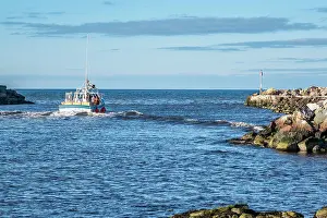 Occupation Prints: Crab fishermen exiting the safety of Glace Bay Harbour Nova Scotia after dropping their catch off at the seafood