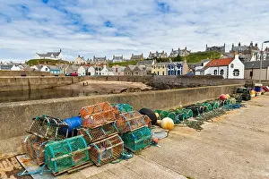 Crab Prints: CRAB AND LOBSTER POTS OR CREELS ALONG THE HARBOUR WALL FINDOCHTY MORAY COAST SCOTLAND