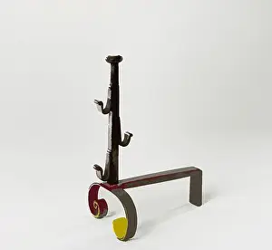 Designed Prints: A creatively designed metal sculpture featuring a tall