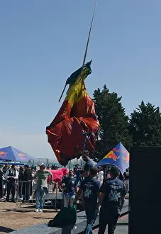 Bright Day Prints: Crew members watch as a crumpled flying craft is hoisted after participating in Red Bull Flugtag
