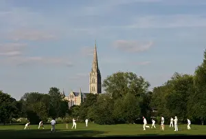 Wiltshire Prints: A Cricket Match being played within sight of Salisbury Cathedral, Wiltshire. UK