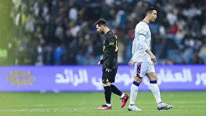 Ronaldo Prints: Cristiano Ronaldo spits as Lionel Messi walks near during the Riyadh All-Star XI vs Paris Saint-Germain FC at King Fahd