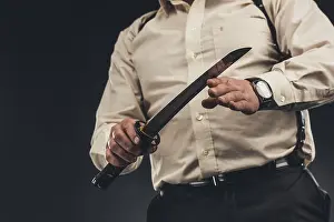 Mafia Prints: cropped shot of yakuza member with japanese tanto knife