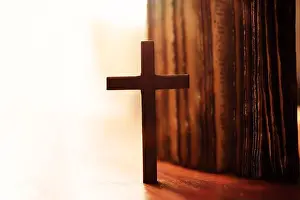 Crucifix Prints: The cross of God in the rays of the sun. Background religions