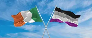 Dialogue Prints: two crossed flags asexuality Pride and Ireland waving in wind at cloudy sky